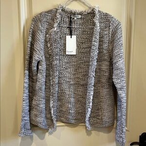 Beautiful women’s sweater size medium brand new with tags never worn